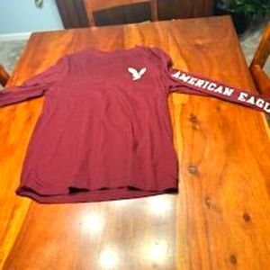 Maroon American Eagle men's long sleeve tee with logo and name on sleeve